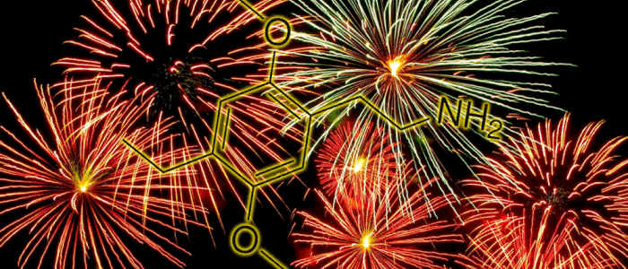 2C-E molecule flashing before a background of fireworks